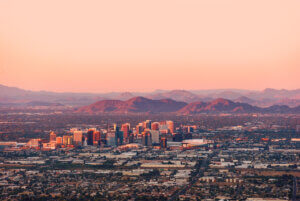 Phoenix Arizona with its downtown lit by the last rays of sun at the dusk. Phoenix Arizona with its downtown lit by the last rays of sun at the dusk.